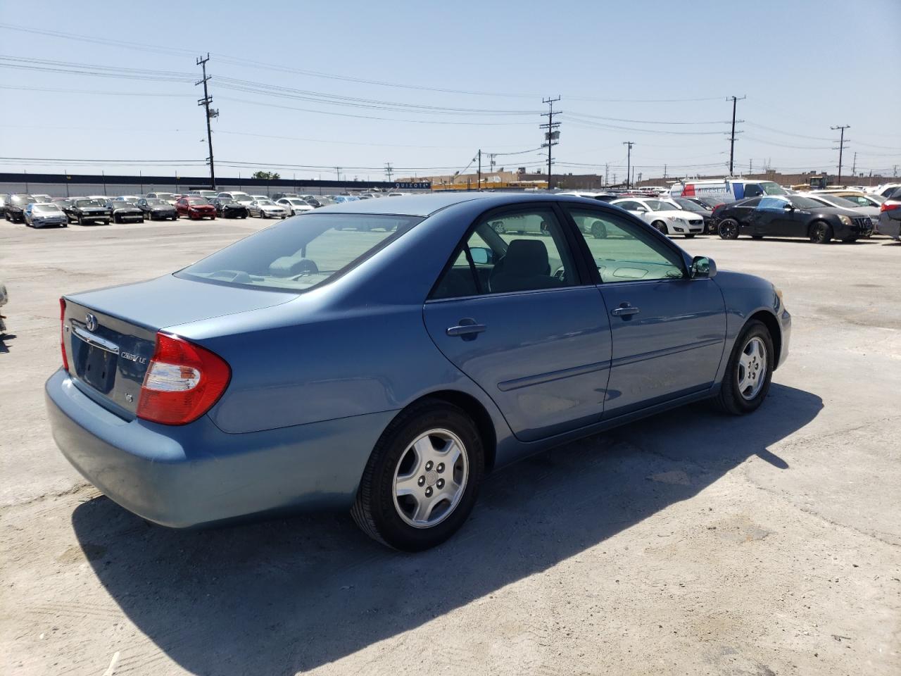 Photo 4 from auction – 2002 TOYOTA CAMRY LE with VIN 4T1BF30K52U500995