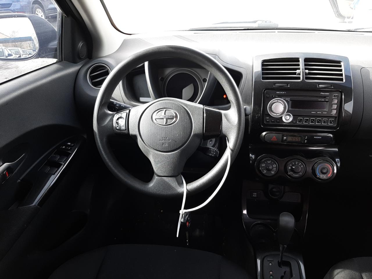 Photo 9 from auction – 2010 TOYOTA SCION XD with VIN JTKKU4B41A1007290