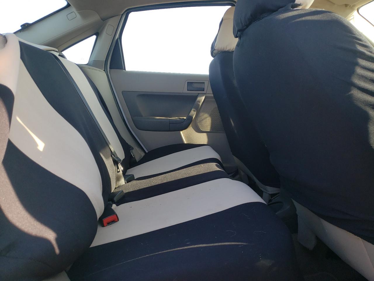 Foto 6 de la subasta – 2008 FORD FOCUS con VIN 1FAHP35NX8W218966