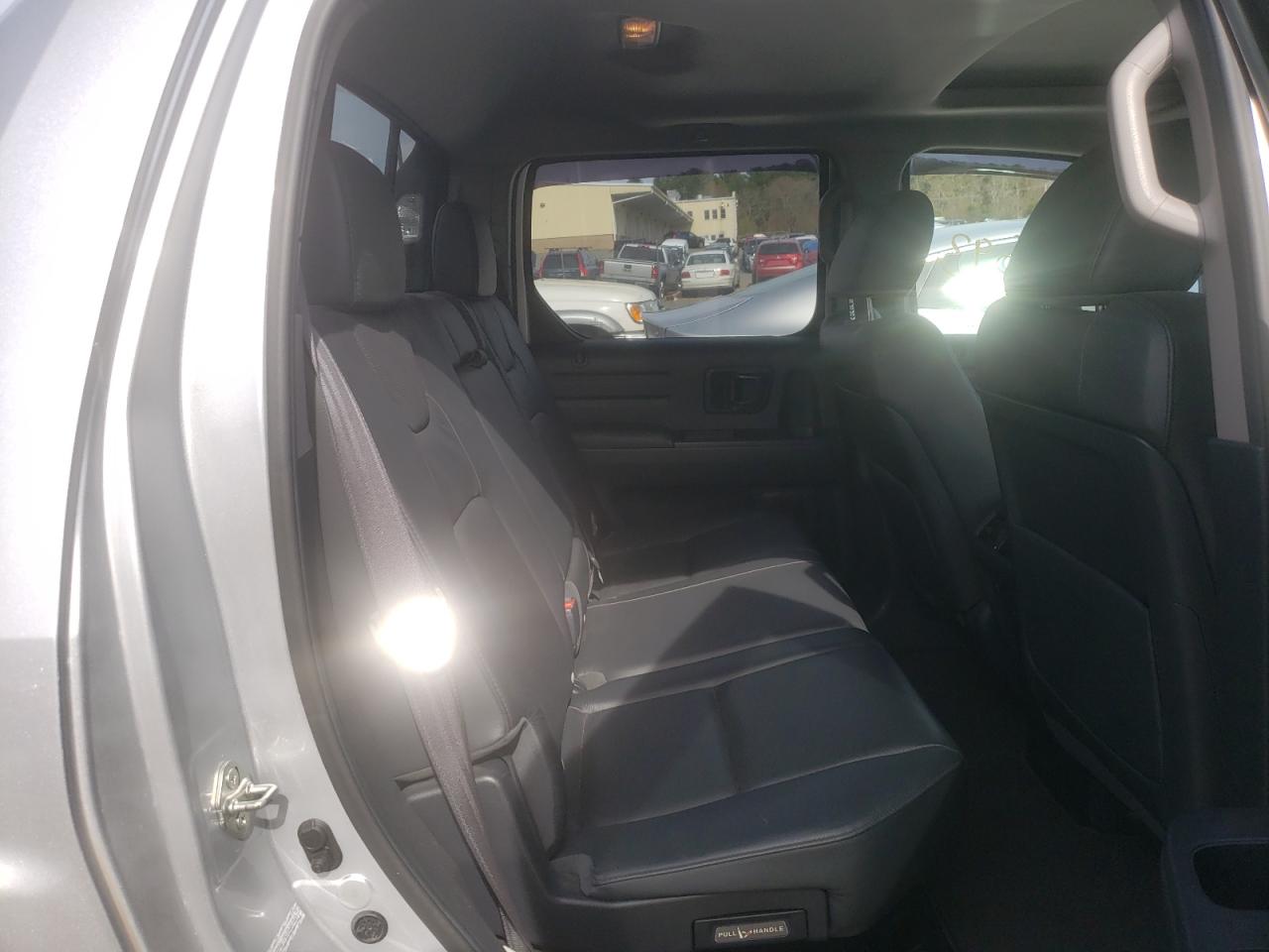 Photo 6 from auction – 2012 HONDA RIDGELINE with VIN 5FPYK1F51CB451943