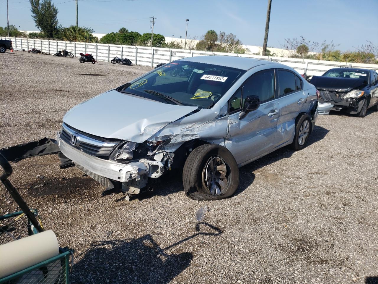 Photo 2 from auction – 2012 HONDA CIVIC LX with VIN 19XFB2F50CE046135