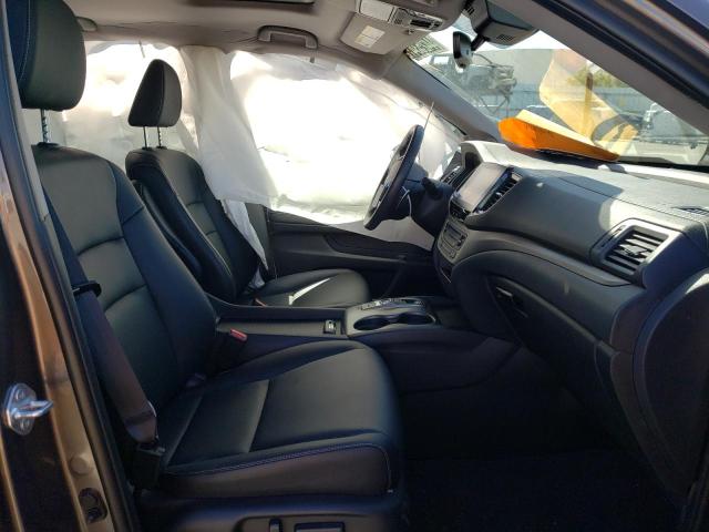Photo 5 from auction – 2021 HONDA RIDGELINE with VIN 5FPYK3F55MB023385