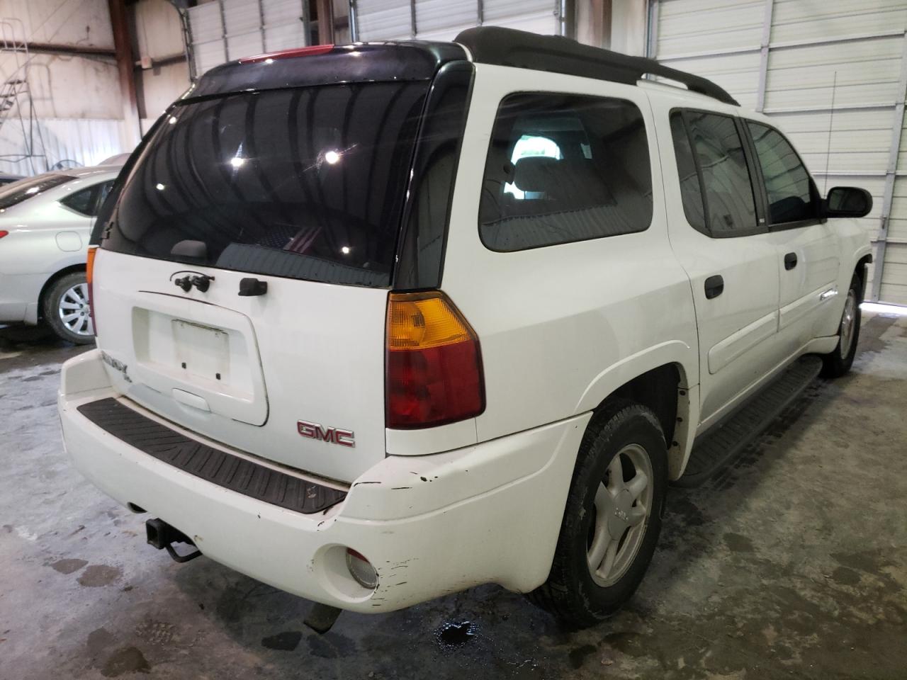 Photo 4 from auction – 2003 GMC ENVOY XL with VIN 1GKET16S836230936