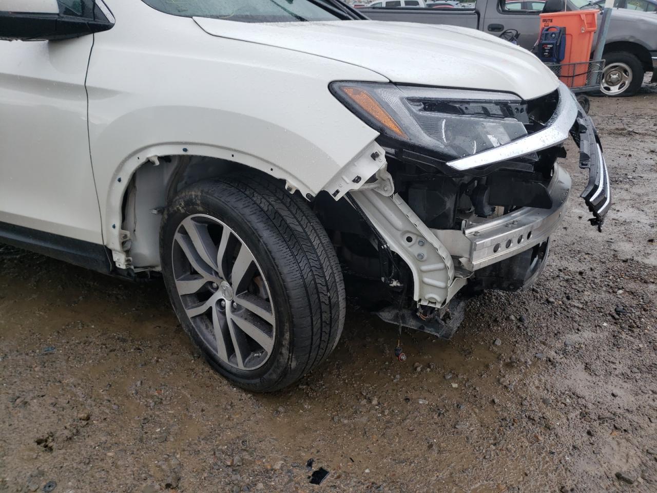 Photo 9 from auction – 2017 HONDA PILOT ELIT with VIN 5FNYF6H06HB071550