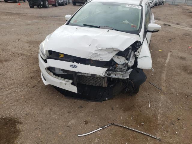 Photo 9 from auction – 2015 FORD FOCUS SE with VIN 1FADP3K24FL318746