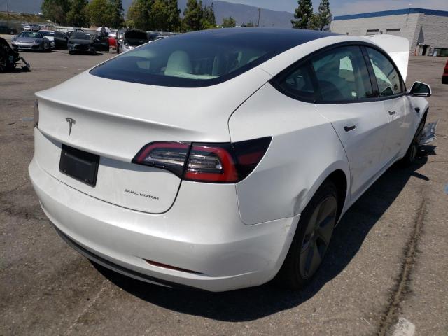 Photo 4 from auction – 2021 TESLA MODEL 3 with VIN 5YJ3E1EBXMF084639