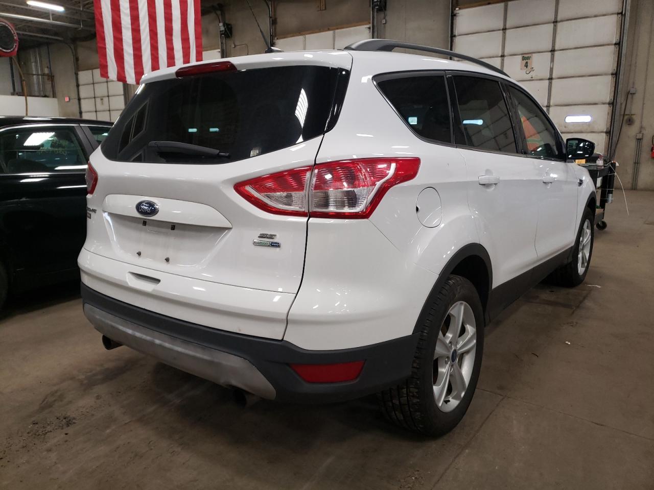 Photo 4 from auction – 2013 FORD ESCAPE SE with VIN 1FMCU9GX8DUD31010
