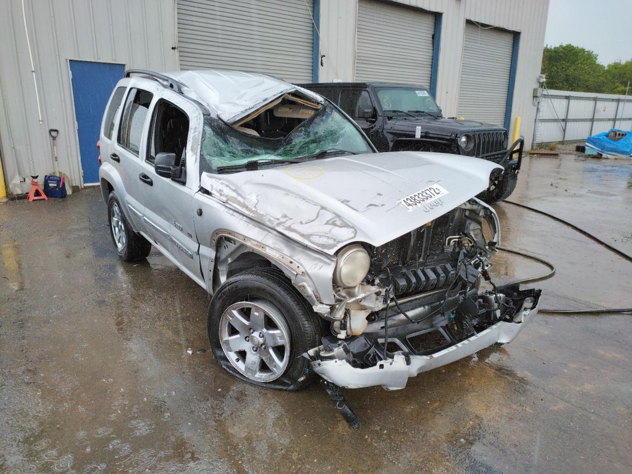 Photo 9 from auction – 2002 JEEP LIBERTY LI with VIN 1J4GL58KX2W156906