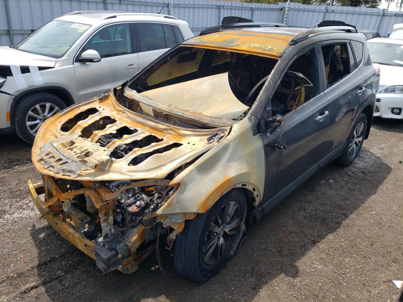 Photo 2 from auction – 2018 TOYOTA RAV4 LE with VIN 2T3BFREV5JW790991