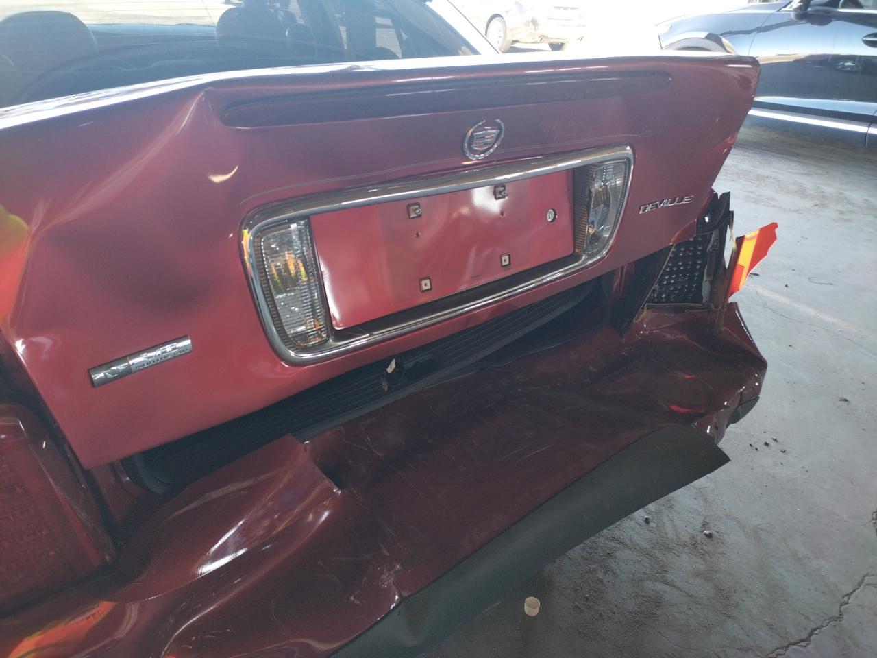 Photo 9 from auction – 2004 CADILLAC DEVILLE with VIN 1G6KD54Y54U195699
