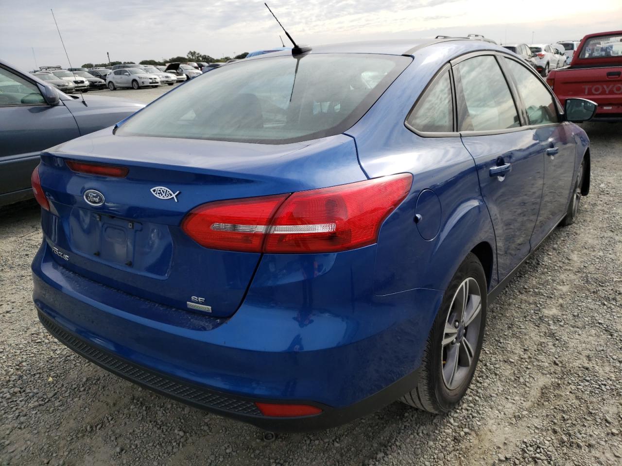 Photo 4 from auction – 2018 FORD FOCUS SE with VIN 1FADP3FE8JL224303