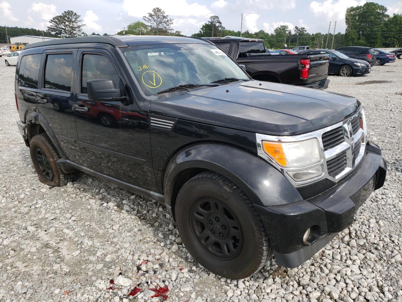 DODGE NITRO SE 2010 with VIN 1D4PT2GK7AW105287 - Photo from auction