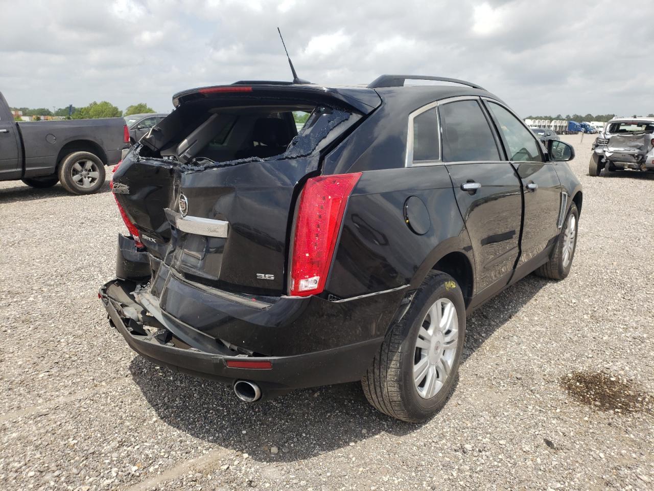 Photo 14 from auction – 2013 CADILLAC SRX with VIN 3GYFNAE35DS630920
