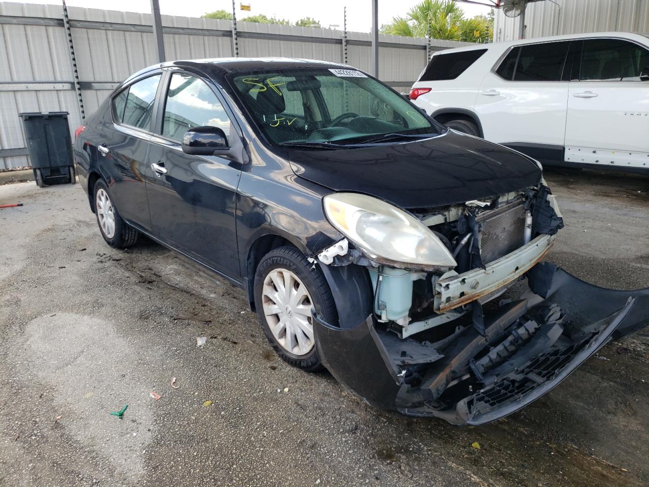 NISSAN VERSA S 2012 with VIN 3N1CN7APXCL834418 - Photo from auction