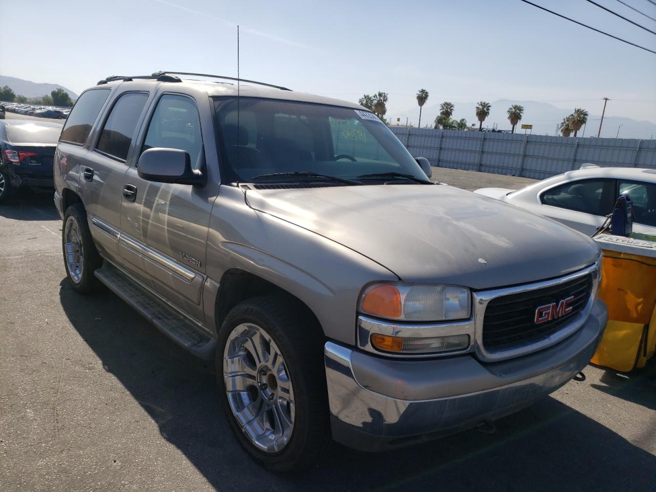 GMC YUKON 2001 with VIN 1GKEC13V51J303592 - Photo from auction