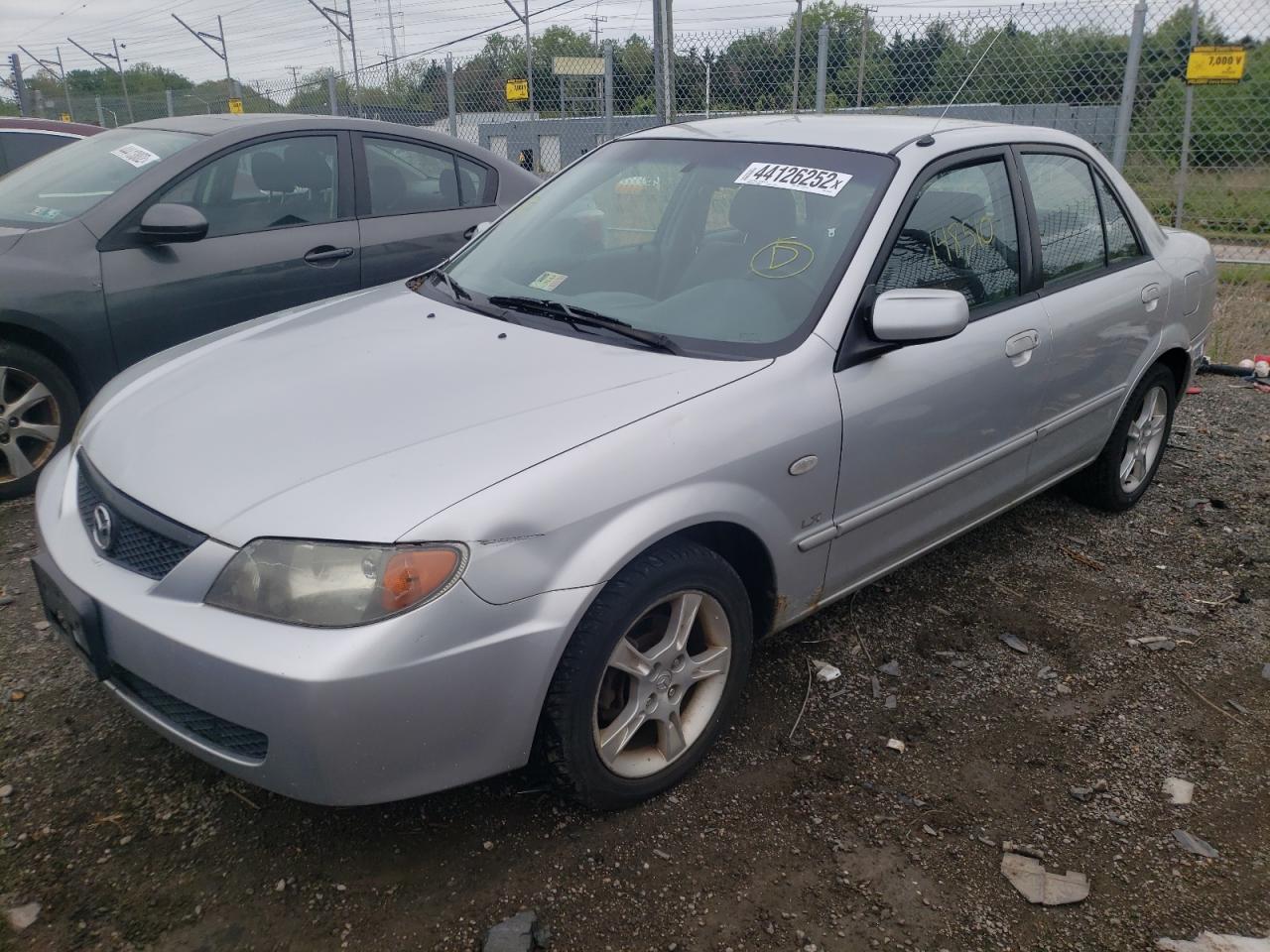 Photo 2 from auction – 2003 MAZDA PROTEGE DX with VIN JM1BJ225530145226