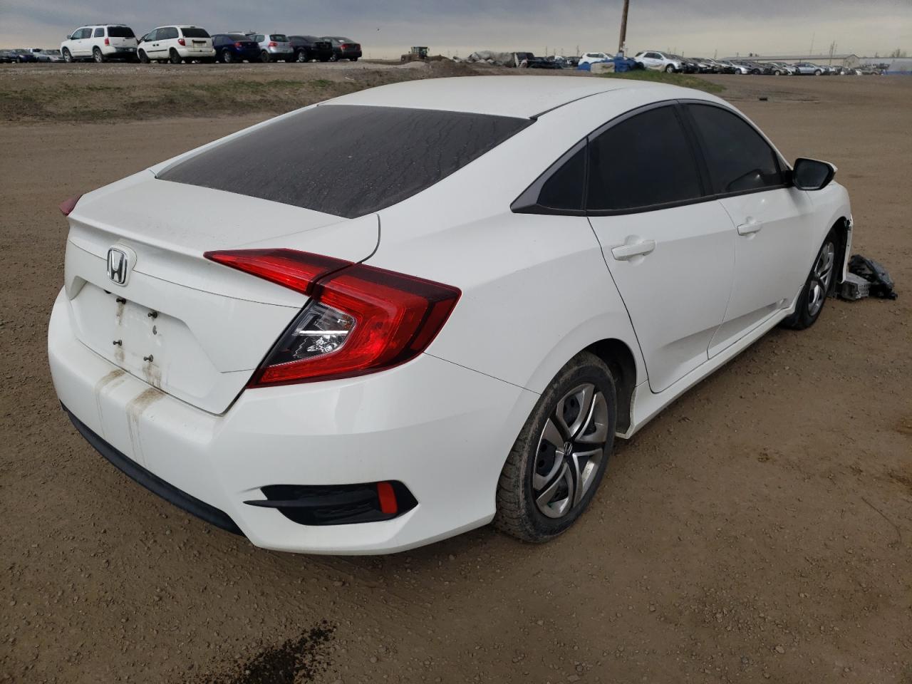 Photo 4 from auction – 2018 HONDA CIVIC LX with VIN 2HGFC2F57JH025038