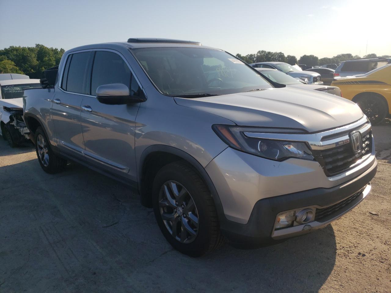 HONDA RIDGELINE 2017 z numerem VIN 5FPYK3F78HB038776 - Zdjęcie z aukcji