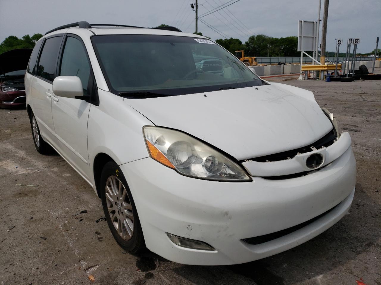TOYOTA SIENNA XLE 2010 with VIN 5TDYK4CC9AS299299 - Photo from auction