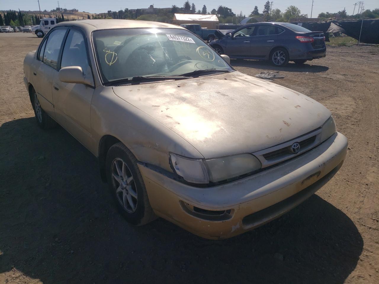TOYOTA COROLLA DX 1996 with VIN 1NXBB02E6TZ389991 - Photo from auction