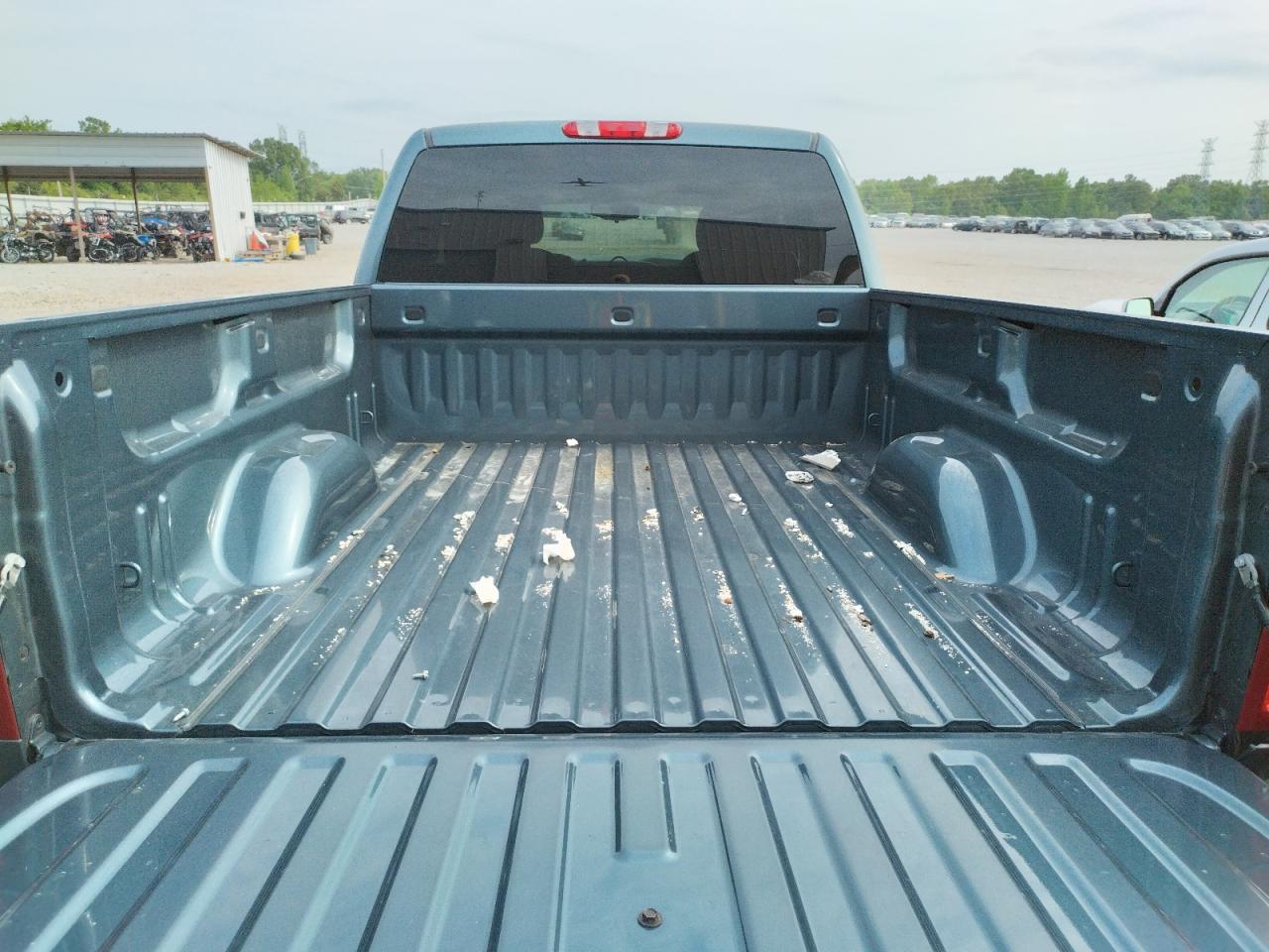 Photo 9 from auction – 2009 GMC SIERRA K15 with VIN 2GTEK290391123565