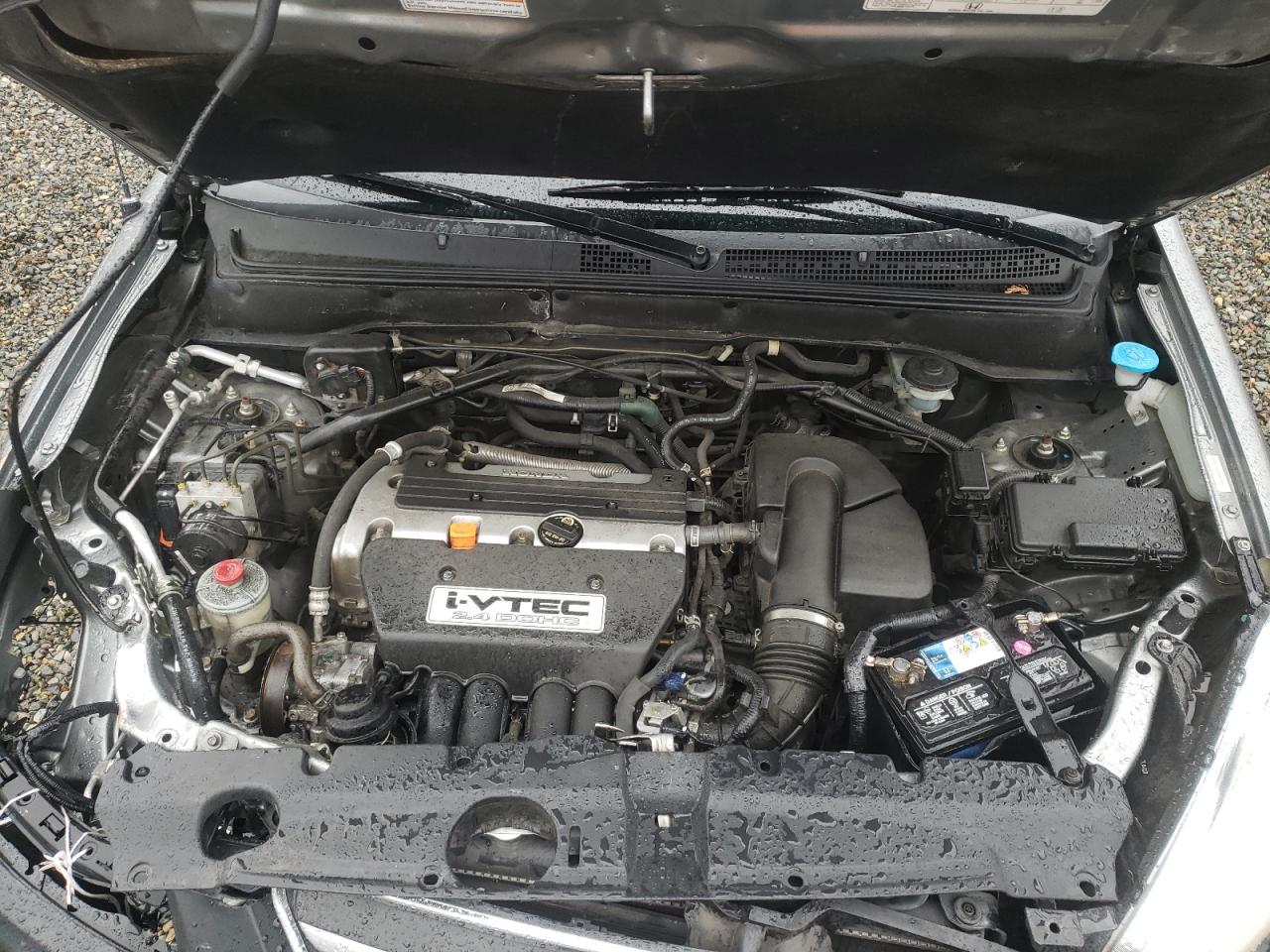 Photo 7 from auction – 2006 HONDA CR-V LX with VIN JHLRD68576C009402
