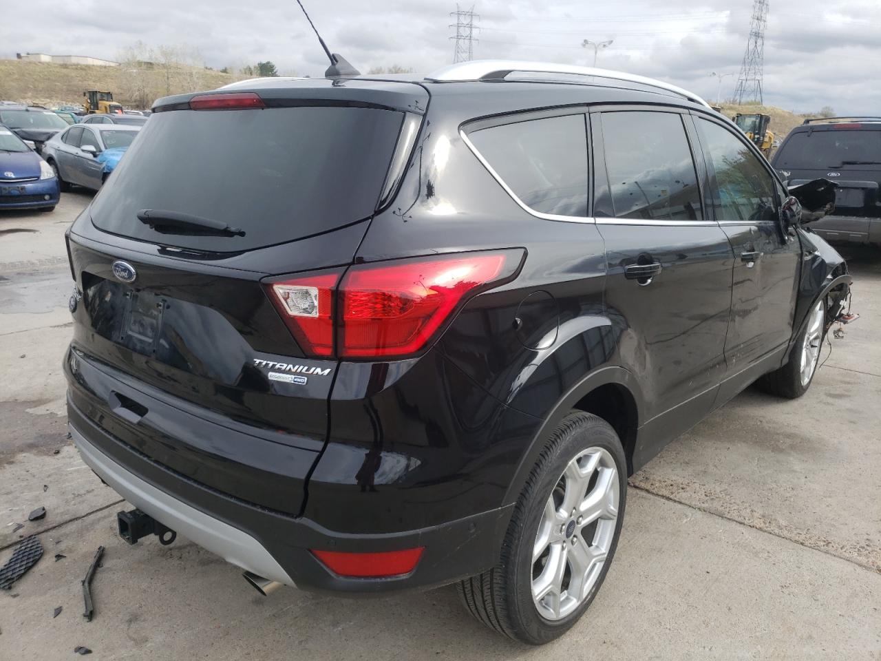 Photo 4 from auction – 2019 FORD ESCAPE TIT with VIN 1FMCU9J93KUA63281