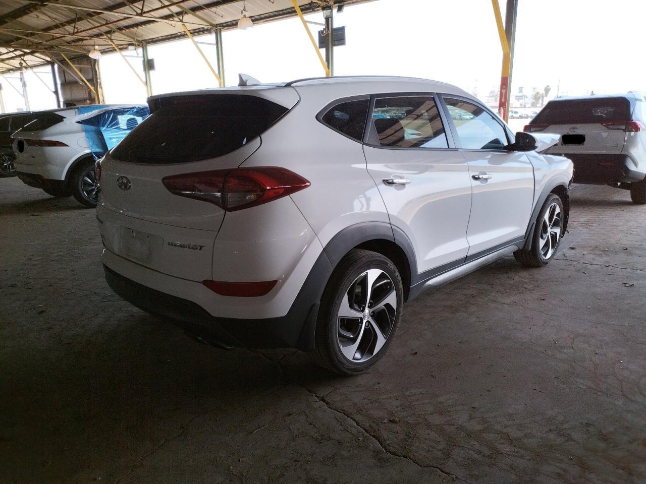 Photo 4 from auction – 2016 HYUNDAI TUCSON LIM with VIN KM8J33A29GU068390