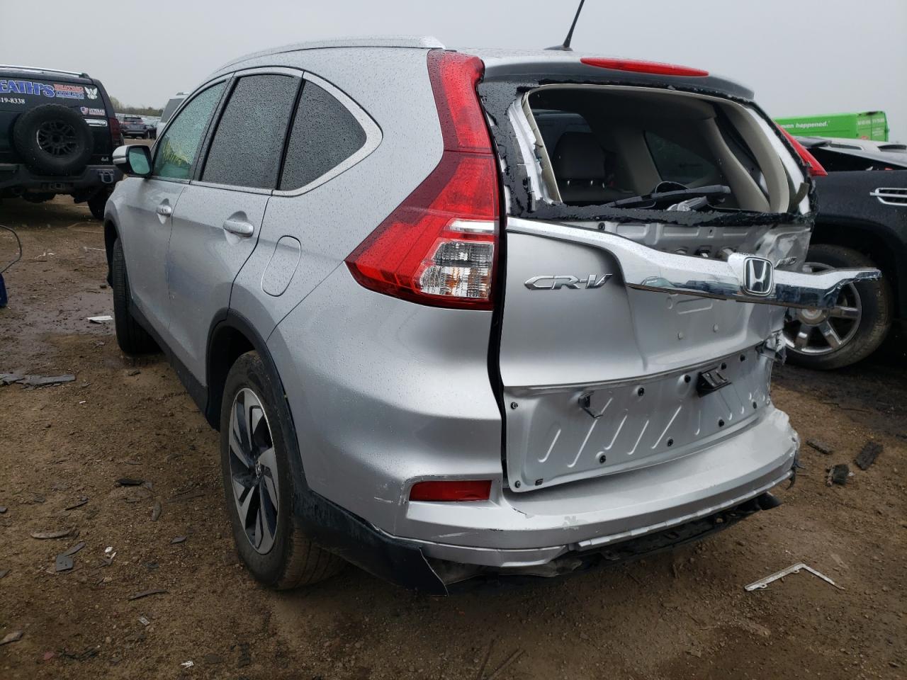Photo 3 from auction – 2015 HONDA CR-V TOURI with VIN 5J6RM4H97FL132776