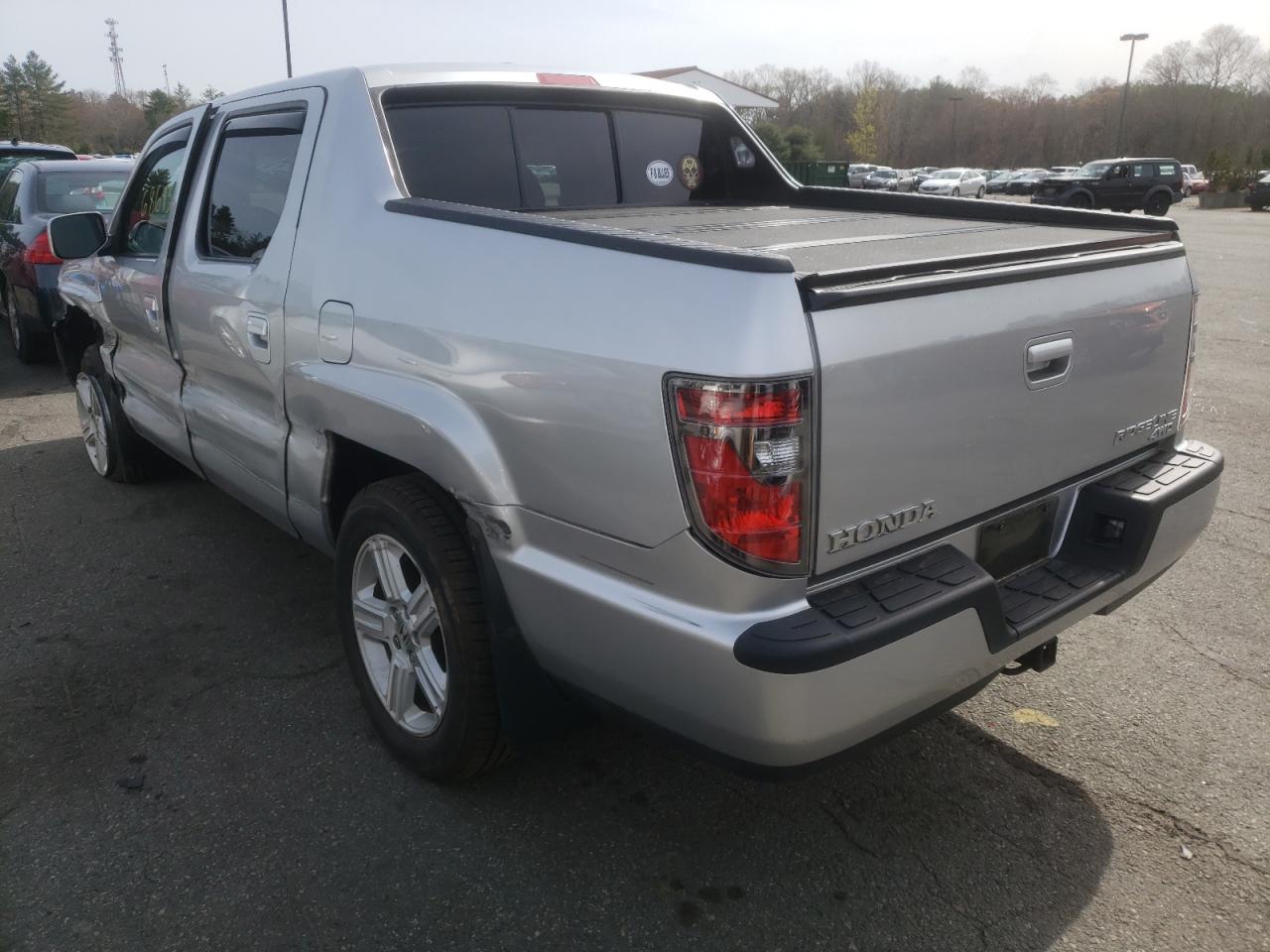 Photo 3 from auction – 2012 HONDA RIDGELINE with VIN 5FPYK1F51CB451943
