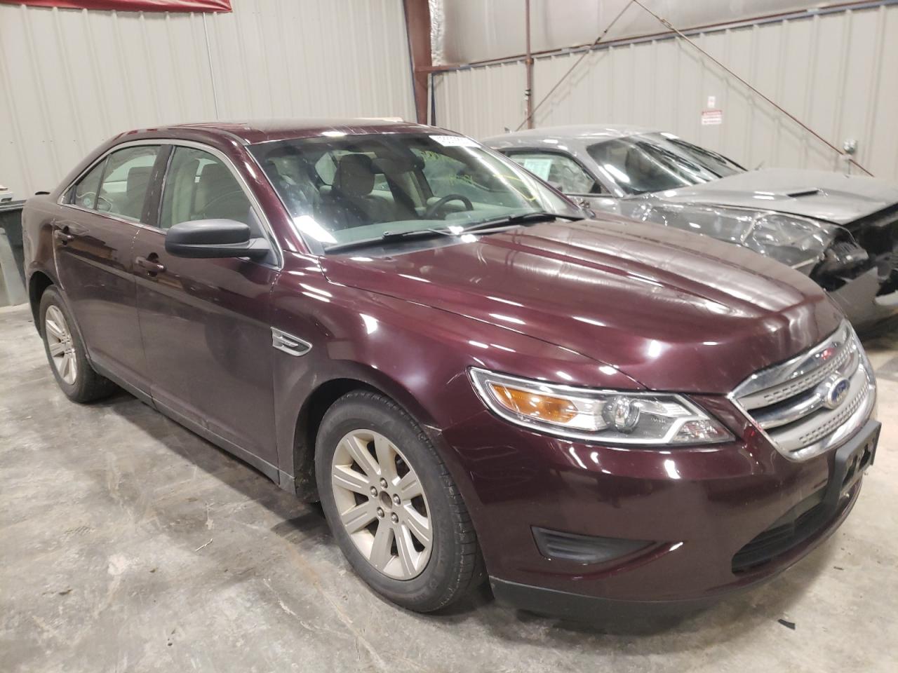 FORD TAURUS SE 2011 with VIN 1FAHP2DW8BG116054 - Photo from auction