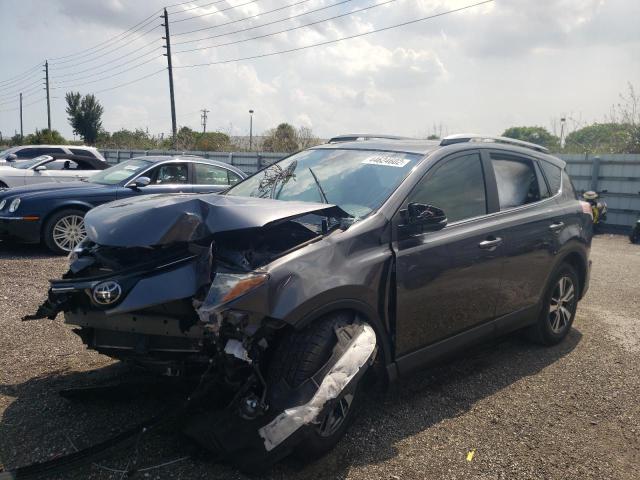 Photo 2 from auction – 2017 TOYOTA RAV4 XLE with VIN JTMWFREV8HJ136268