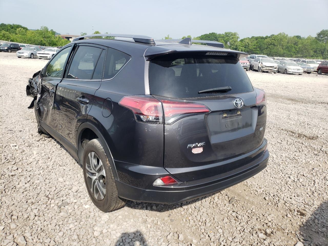 Photo 3 from auction – 2018 TOYOTA RAV4 LE with VIN JTMZFREV5JJ177301
