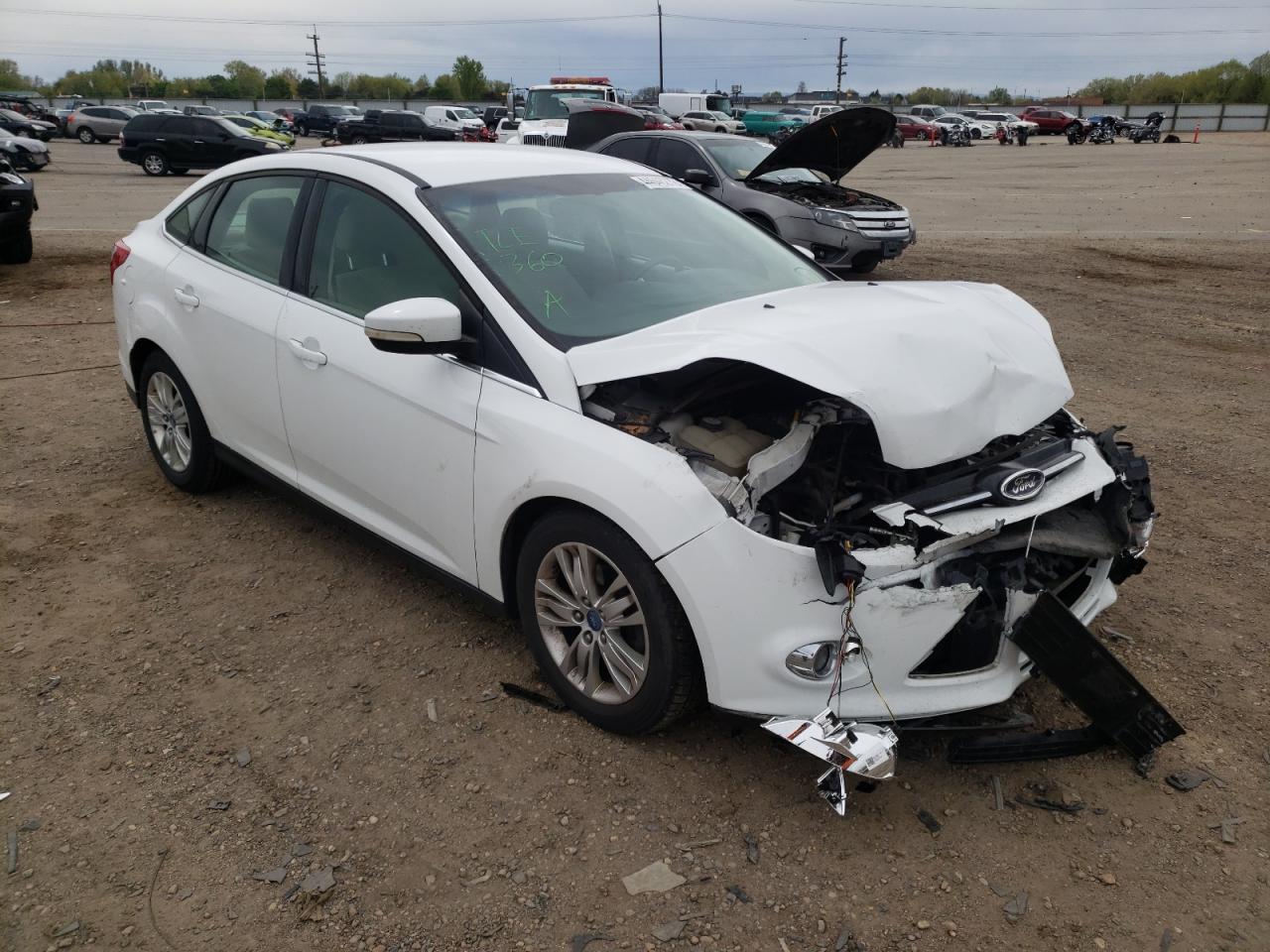 FORD FOCUS SEL 2012 with VIN 1FAHP3H24CL394472 - Photo from auction
