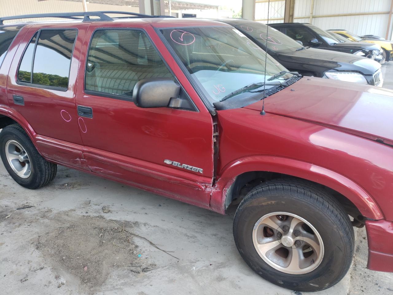 Photo 9 from auction – 2004 CHEVROLET BLAZER with VIN 1GNCS13X34K121497