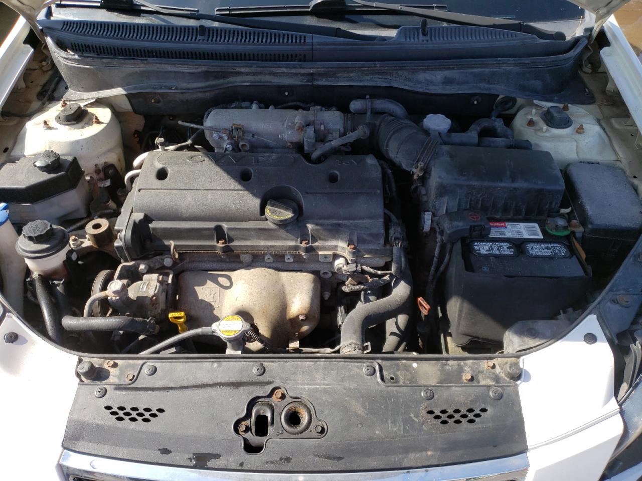 Photo 7 from auction – 2011 KIA RIO BASE with VIN KNADH4A31B6736338