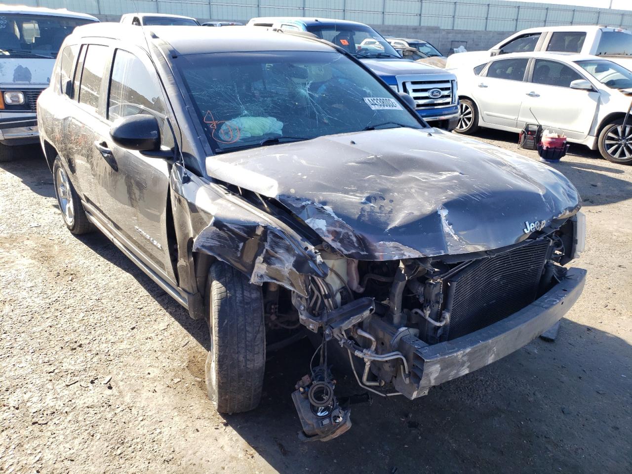 JEEP COMPASS SP 2014 with VIN 1C4NJCBA0ED817821 - Photo from auction