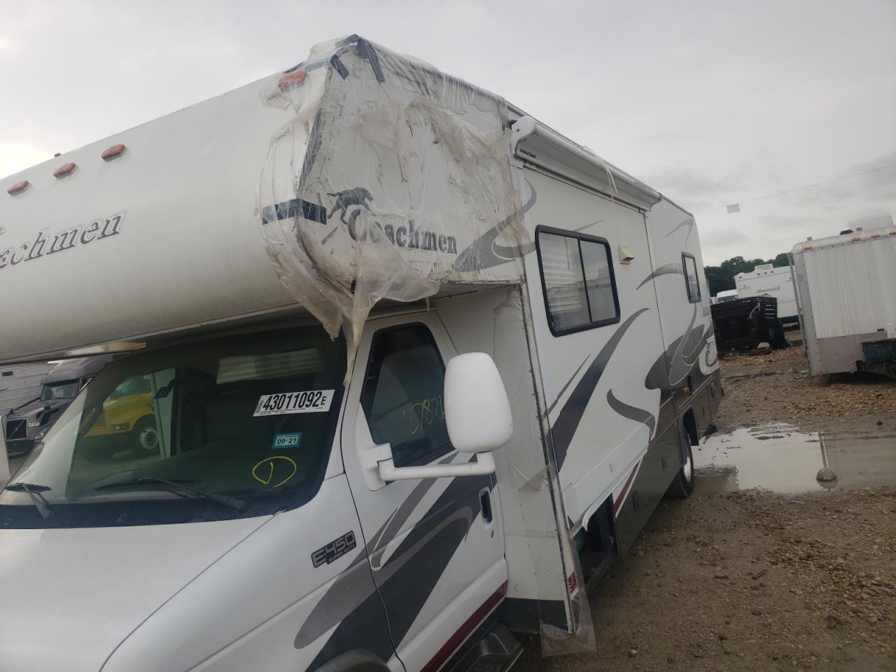 Photo 9 from auction – 2005 COACH SANTARA with VIN 1FDXE45S95HA31589