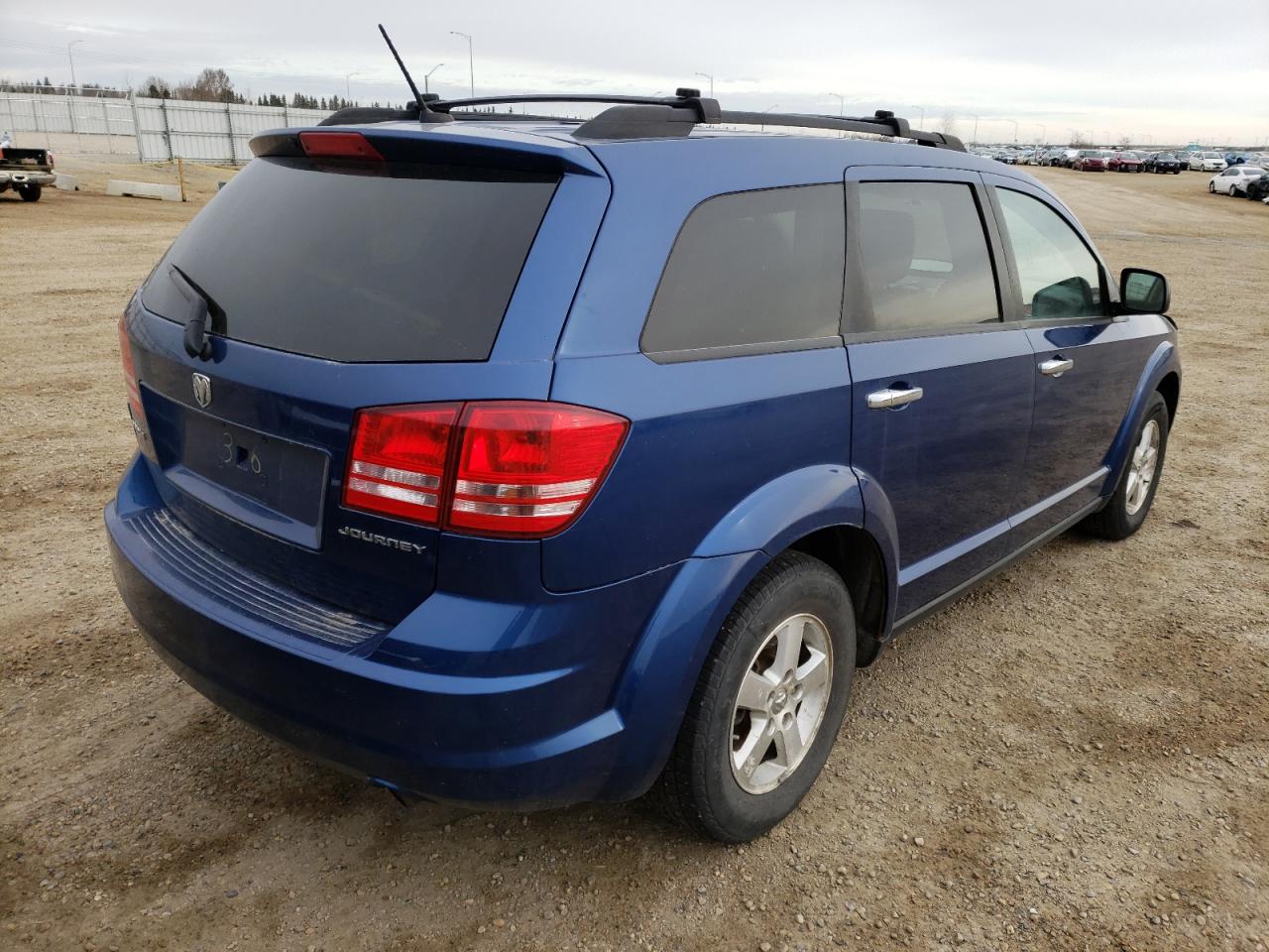 Photo 4 from auction – 2009 DODGE JOURNEY SE with VIN 3D4GG47B99T557209