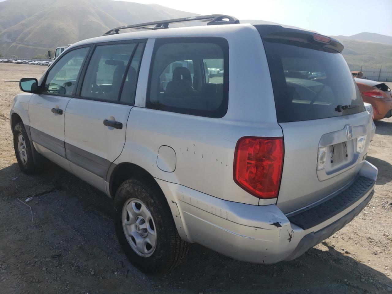 Photo 3 from auction – 2003 HONDA PILOT LX with VIN 2HKYF18163H586554