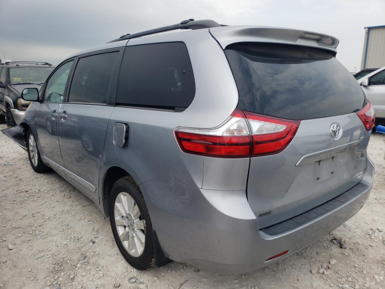 Photo 3 from auction – 2015 TOYOTA SIENNA LE with VIN 5TDJK3DC2FS126869