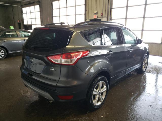Photo 4 from auction – 2016 FORD ESCAPE SE with VIN 1FMCU9GXXGUA80110