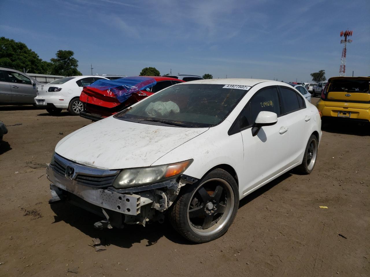 Photo 2 from auction – 2012 HONDA CIVIC LX with VIN 19XFB2F55CE374120