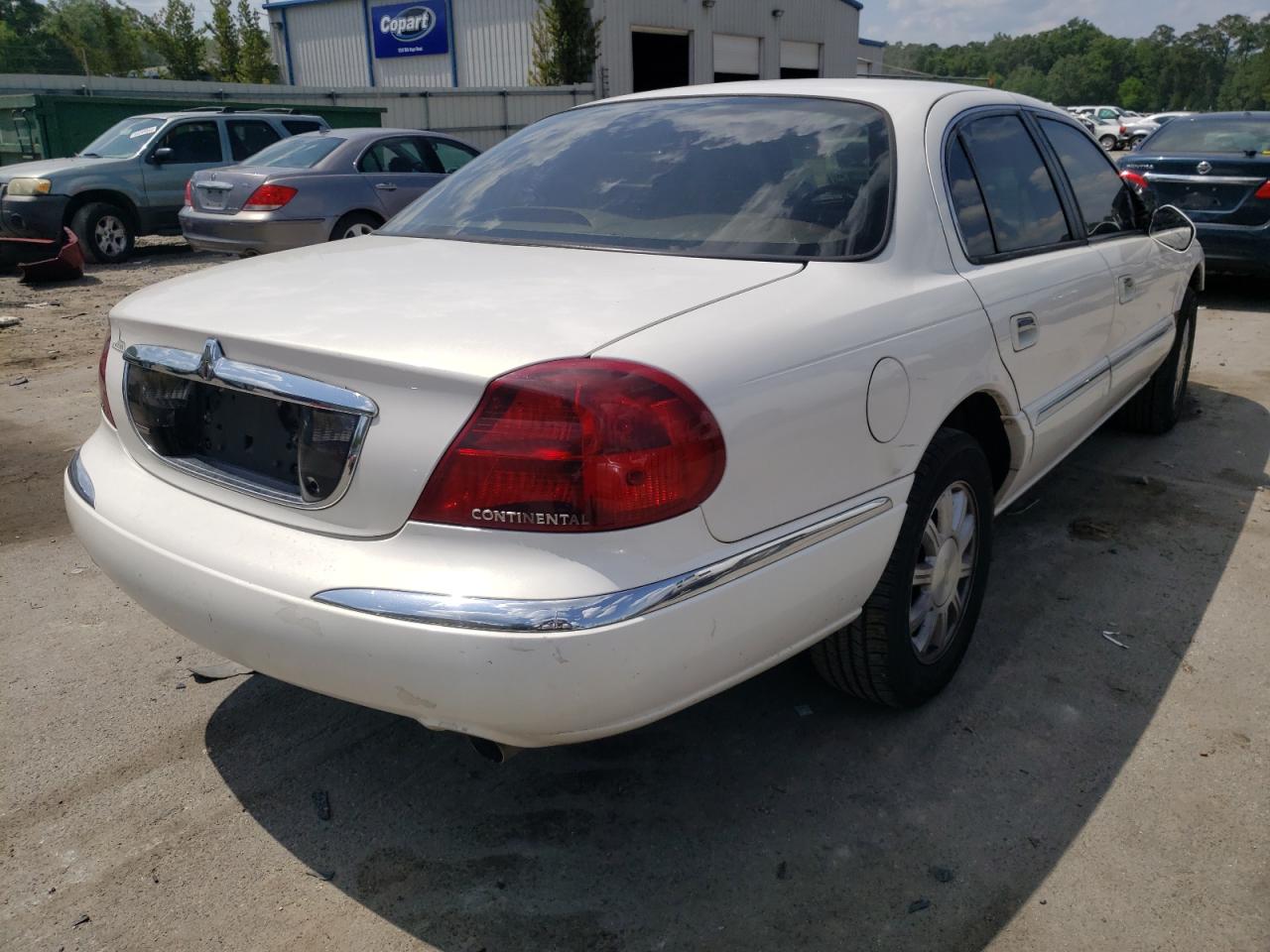 Photo 4 from auction – 2000 LINCOLN CONTINENTA with VIN 1LNHM97V5YY826347