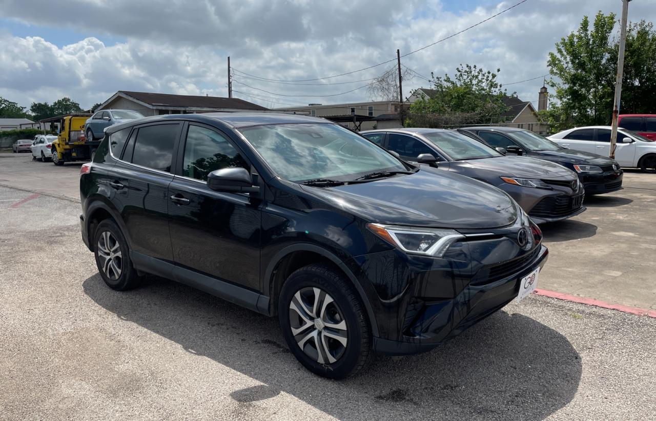 TOYOTA RAV4 LE 2018 with VIN 2T3ZFREV2JW411122 - Photo from auction