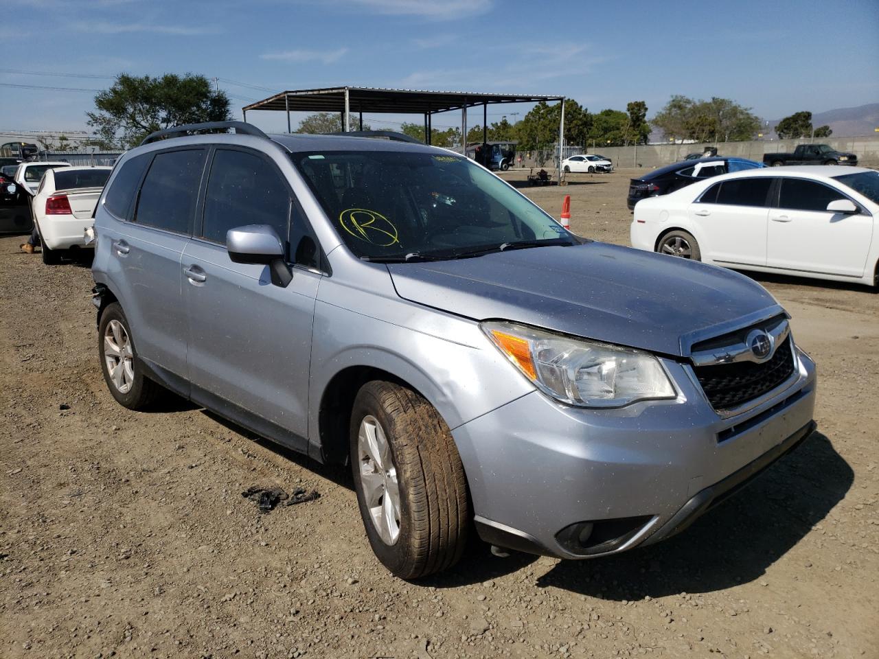 SUBARU FORESTER 2 2014 with VIN JF2SJAHC1EH489612 - Photo from auction