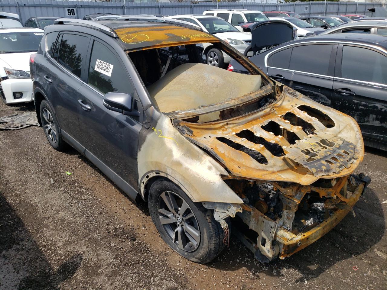 Photo 1 from auction – 2018 TOYOTA RAV4 LE with VIN 2T3BFREV5JW790991