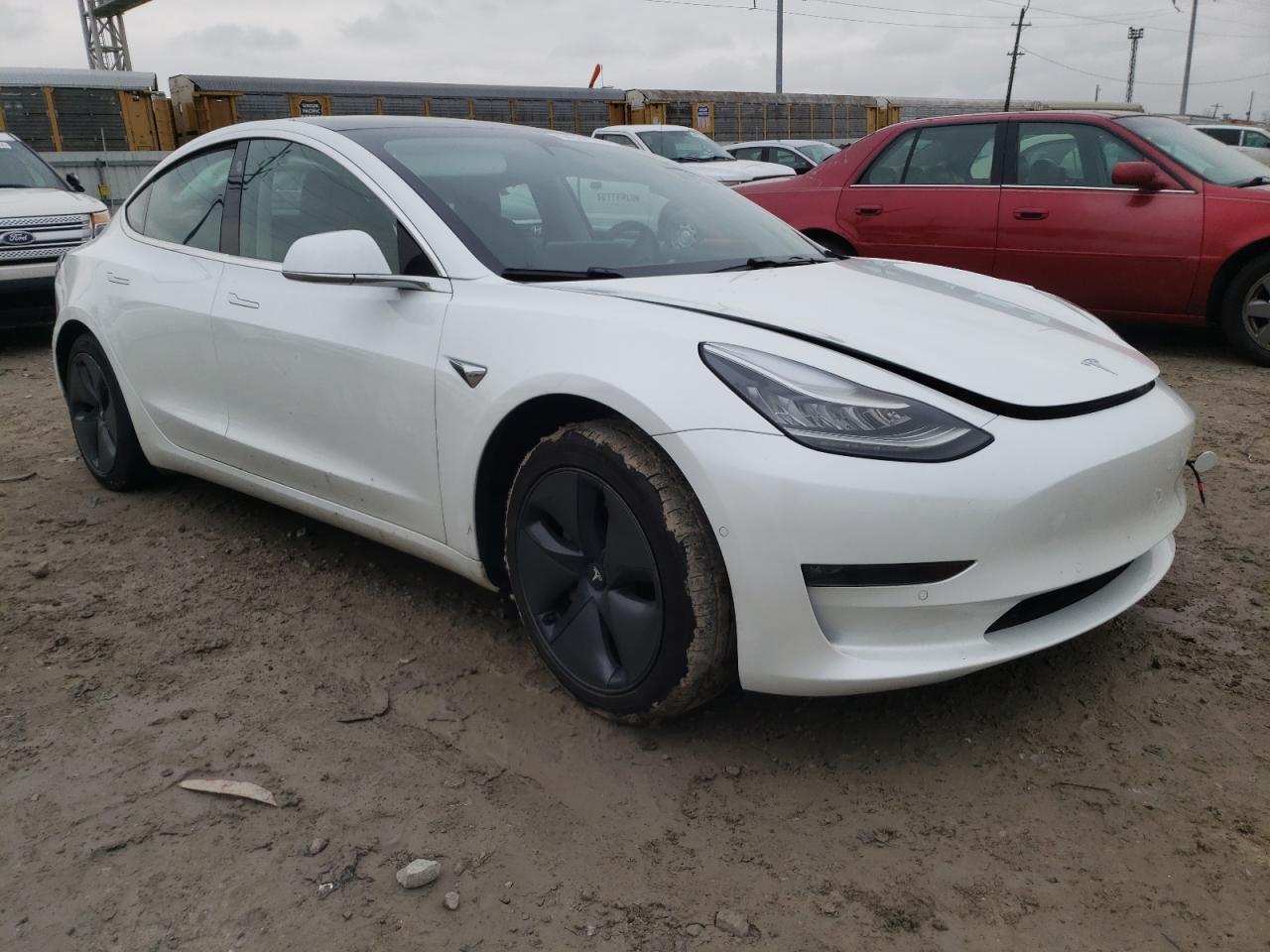 TESLA MODEL 3 2019 with VIN 5YJ3E1EB0KF515700 - Photo from auction