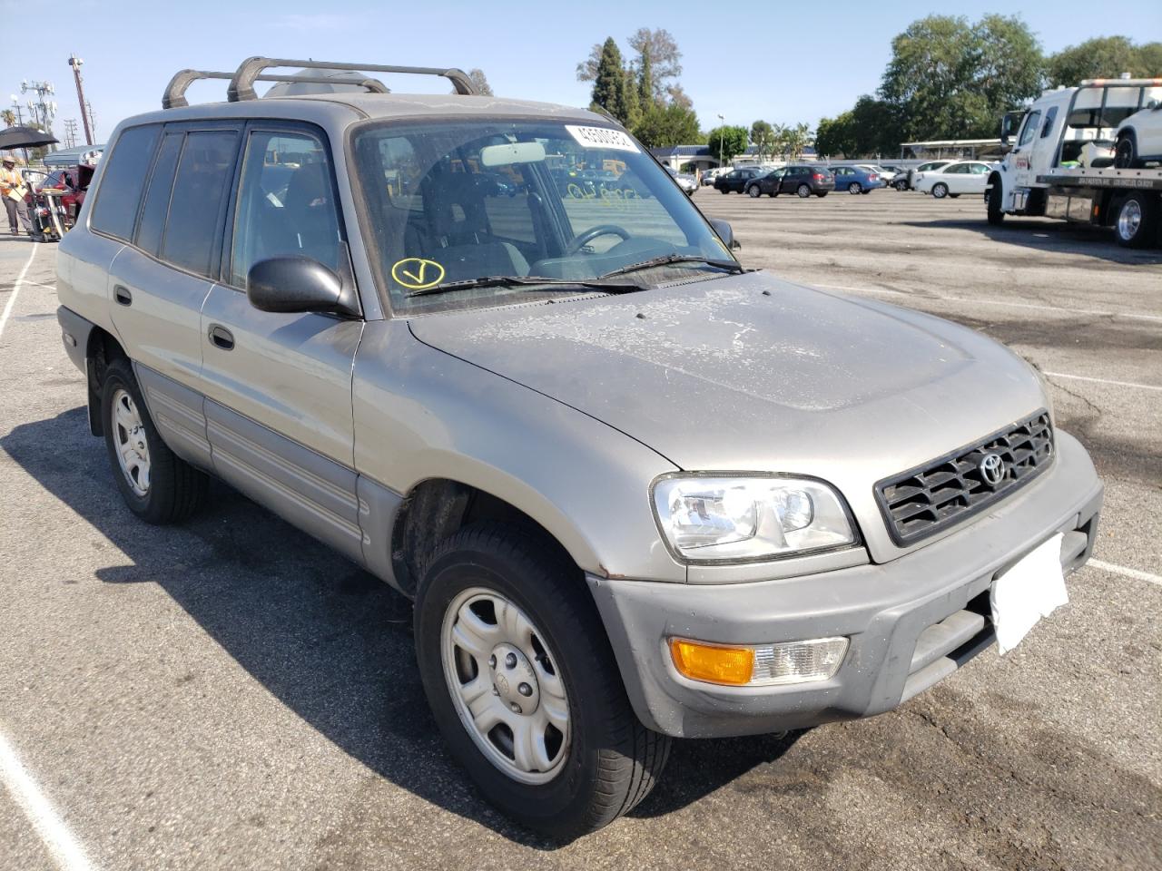 TOYOTA RAV4 1999 with VIN JT3GP10V2X0038811 - Photo from auction
