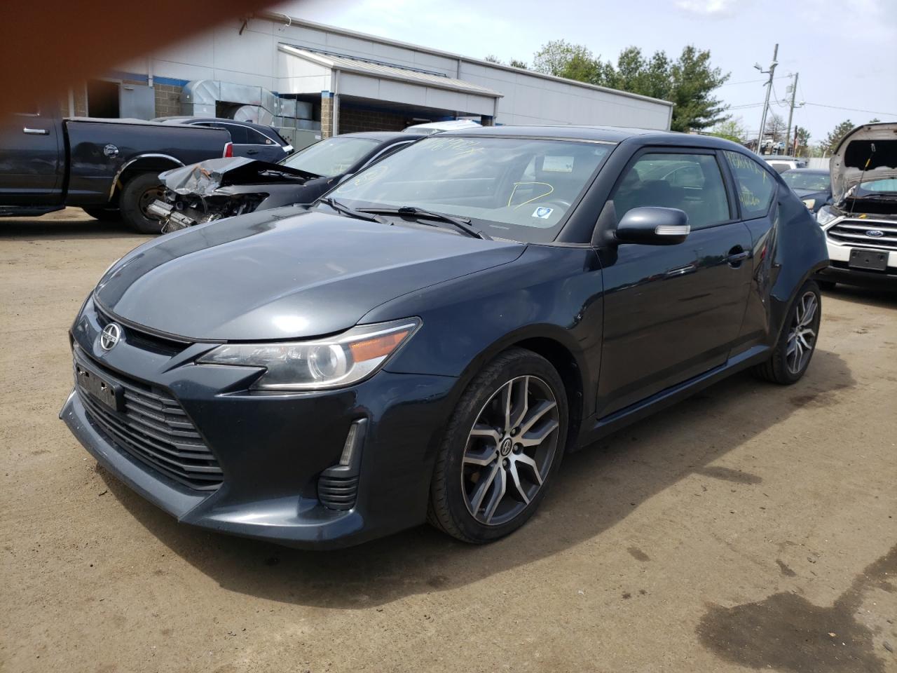 Photo 2 from auction – 2015 TOYOTA SCION TC with VIN JTKJF5C74FJ003018